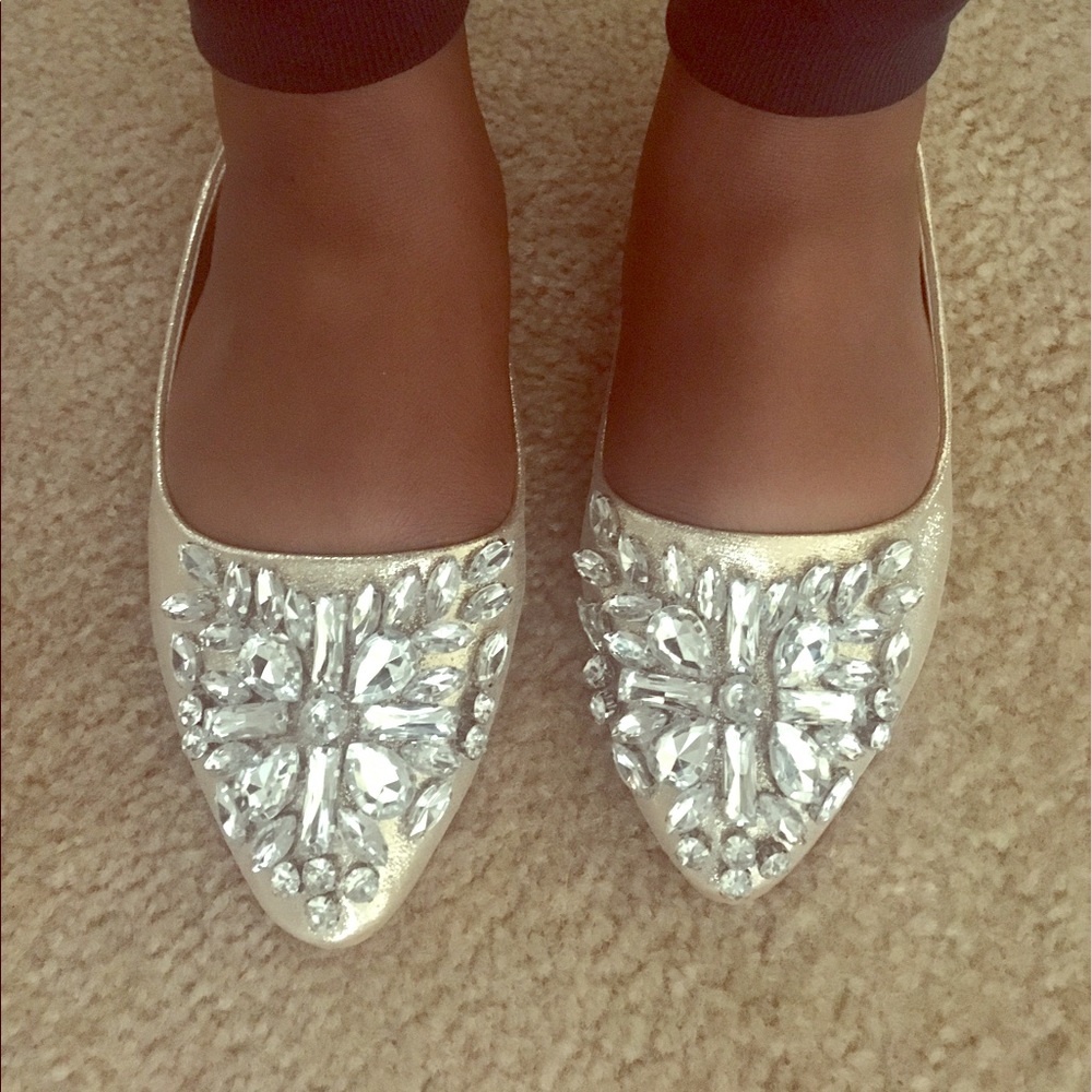 Gold flats with rhinestone embellishments