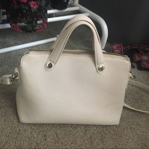Super cute cream tote purse. Long strap