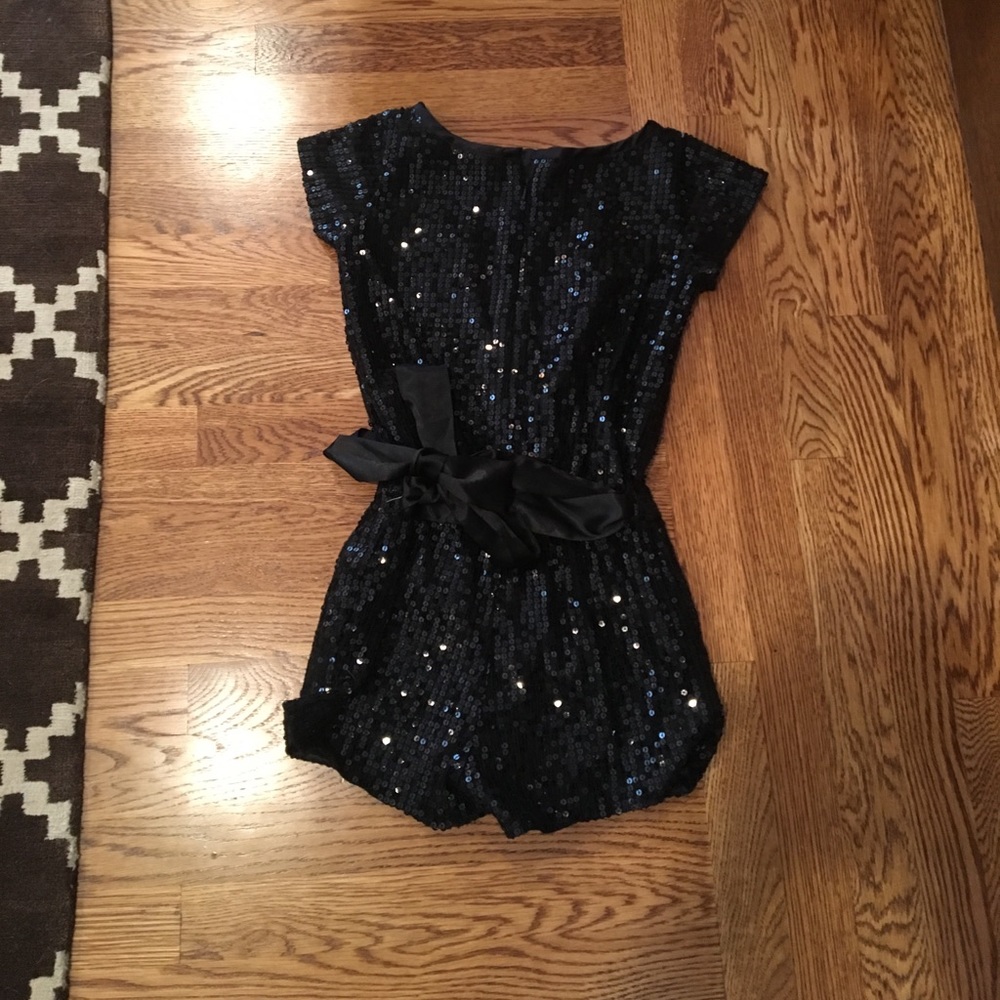 Girls black sparkly sequin romper with satin bow