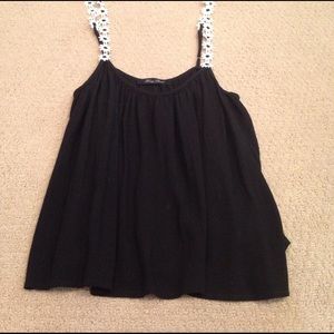 Black tank with daisy straps