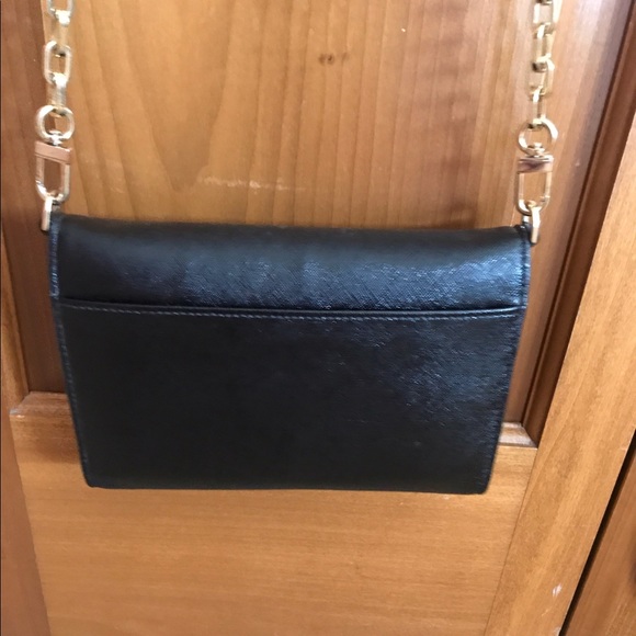 Selling my Tory Burch clutch! Only used 5 times - Picture 4 of 4