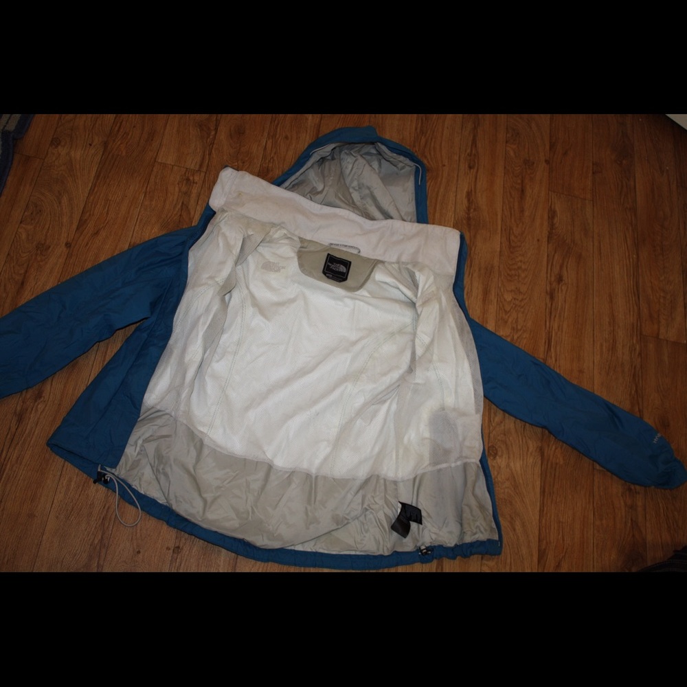 North face rain jacket, fold away hood