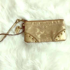 Authentic Coach gold wristlet