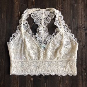 Cream lace Urban Outfitters bralette, size L.
