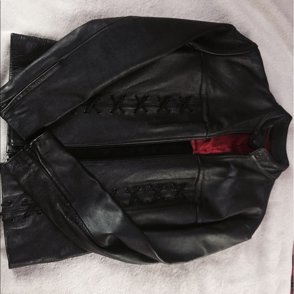 Black leather jacket, interior red.
