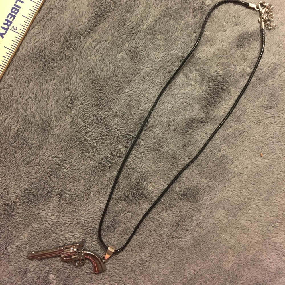 NWOT stainless steel .44 pistol necklace