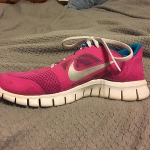 Pink Nike girls athletic shoes