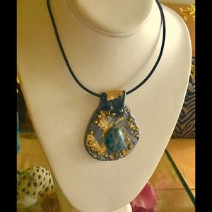 Handmade Polymer Clay With genuine emerald.