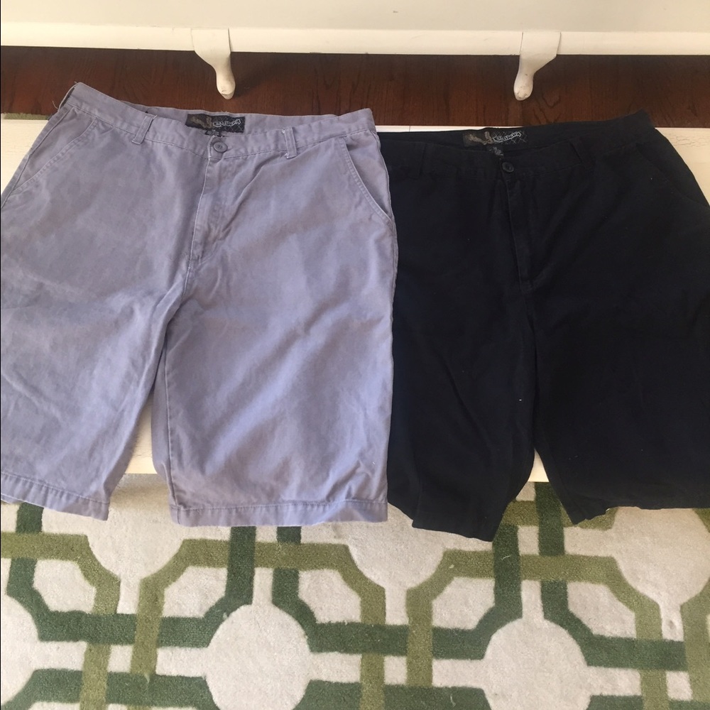 Two pairs of Men's size 38 shorts. Black and Grey