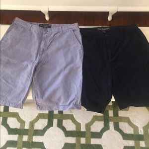 Two pairs of Men's size 38 shorts. Black and Grey