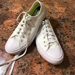 White canvas low-top Converse Chuck IIs