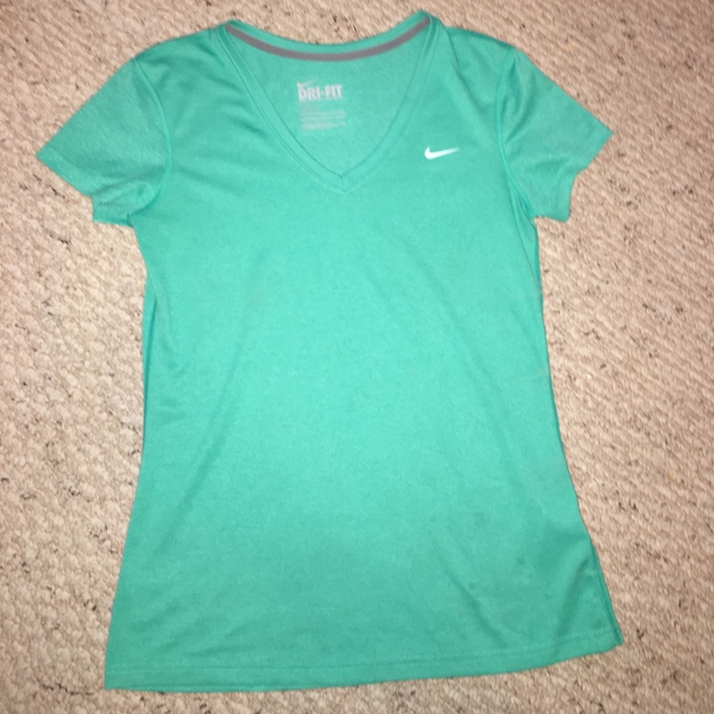 Turquoise Nike shirt