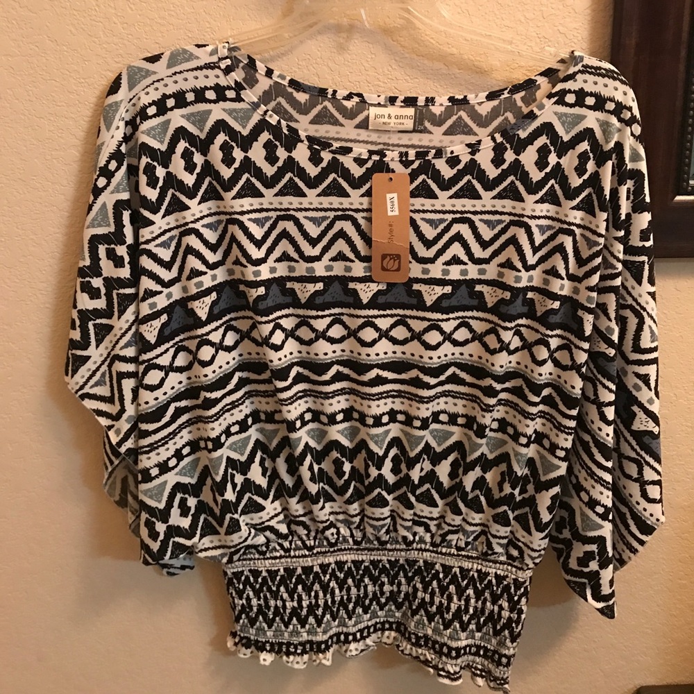 Geometric pattern dolman sleeve blouse