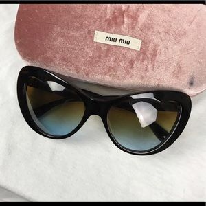 Miu Miu Cat Eye Sunglasses in Tortoise Shell