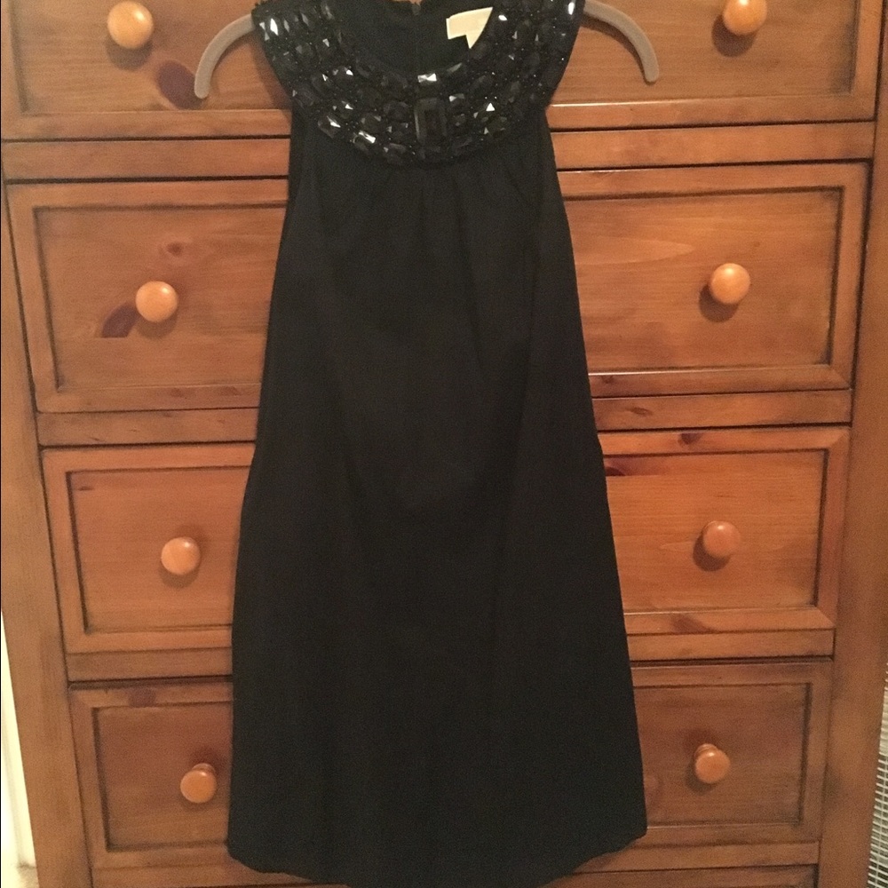 Black Michael Kors cocktail dress. Size small.