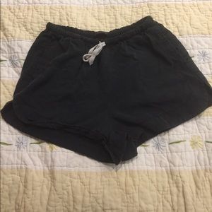 Plain black shorts.