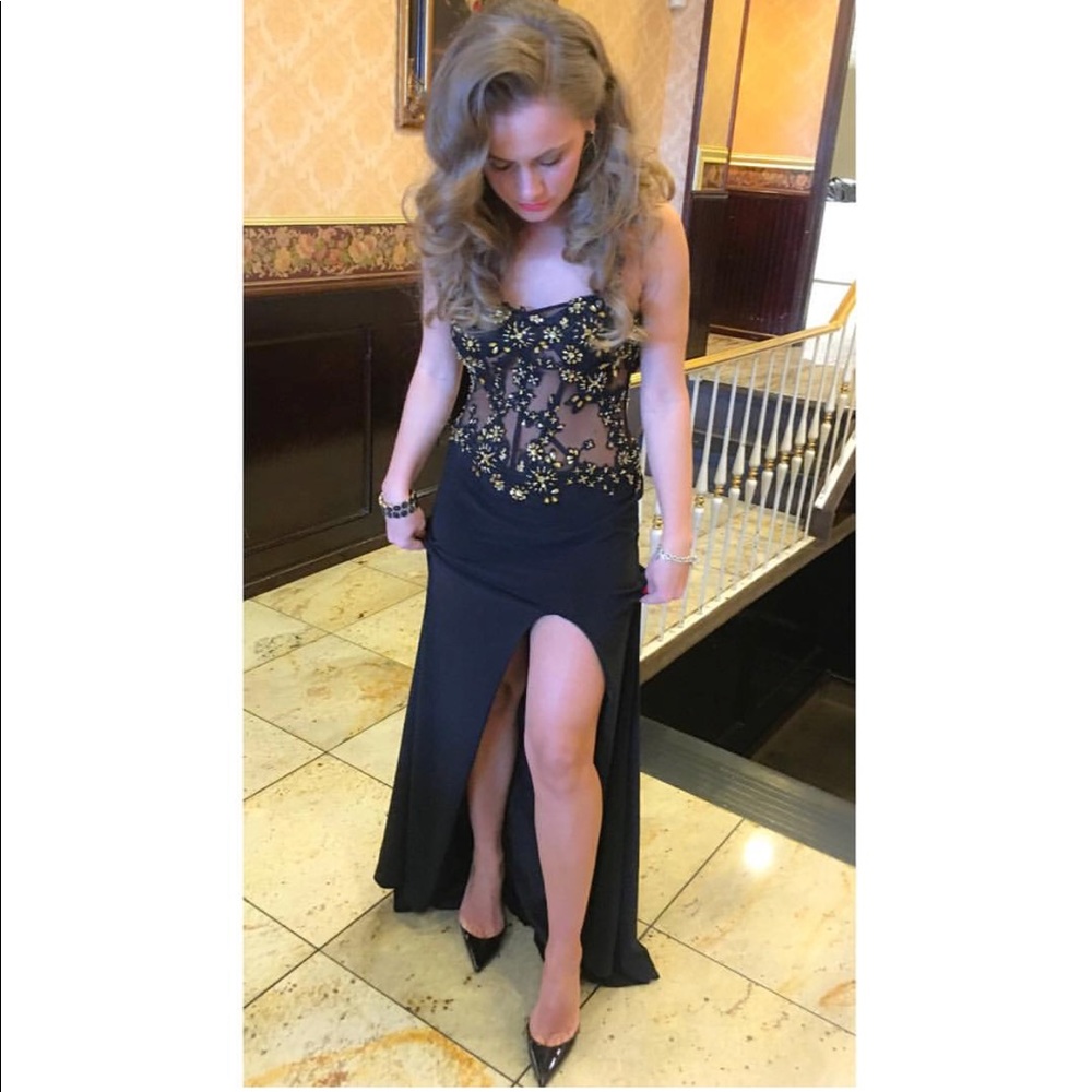 Black jersey knit gown with mesh torso.