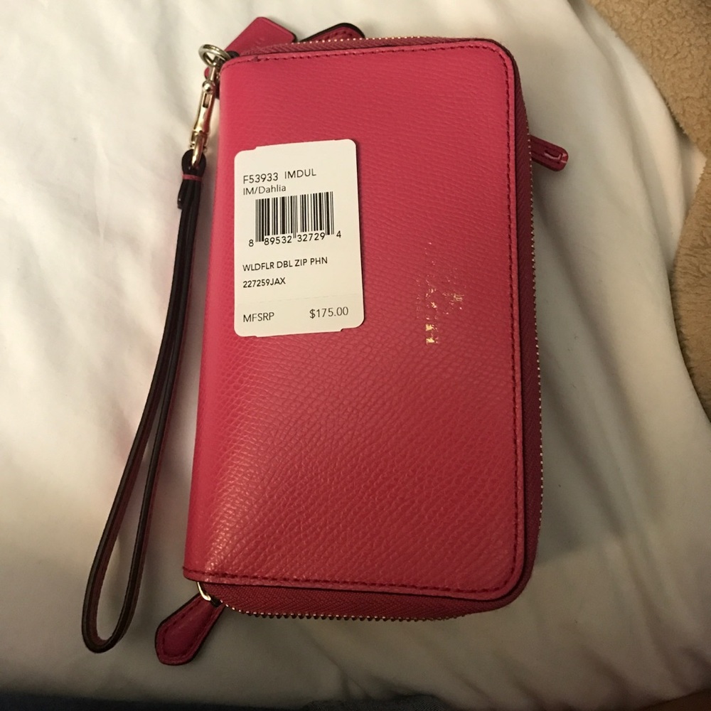 Hot pink and floral Coach wristlet