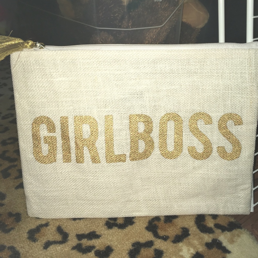 Ivory jute cosmetic case.