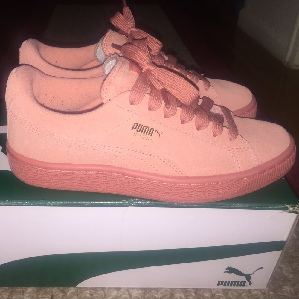 Pink Pumas size 4.5