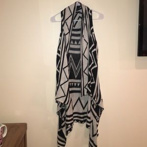 Long sleeveless sweater