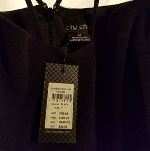 Black City Chic Peplum Dress