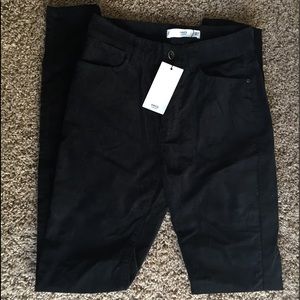 Black velvet skinny pants