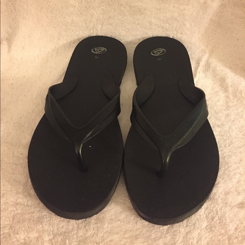 Black rubber flip flop sandals
