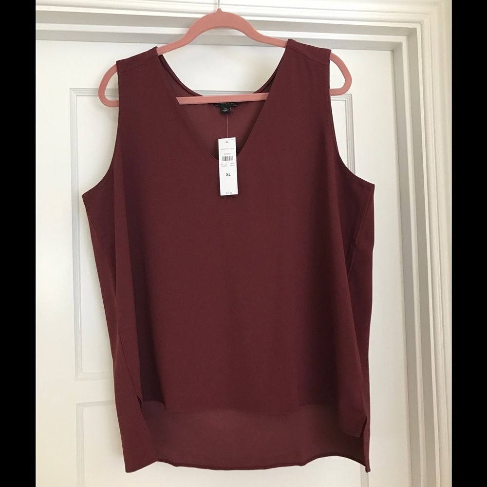 Ann Taylor burgundy sleeveless blouse.