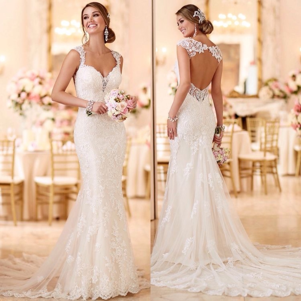 Beautiful mermaid wedding dress in color white
