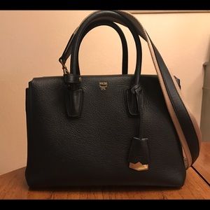Black leather MCM bag , only gently used
