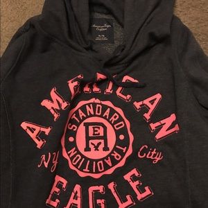 Blue AE hoodie with pink logo.