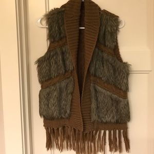 Faux fur vest.