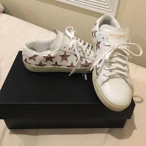 Saint Laurent white and glitter sneakers.