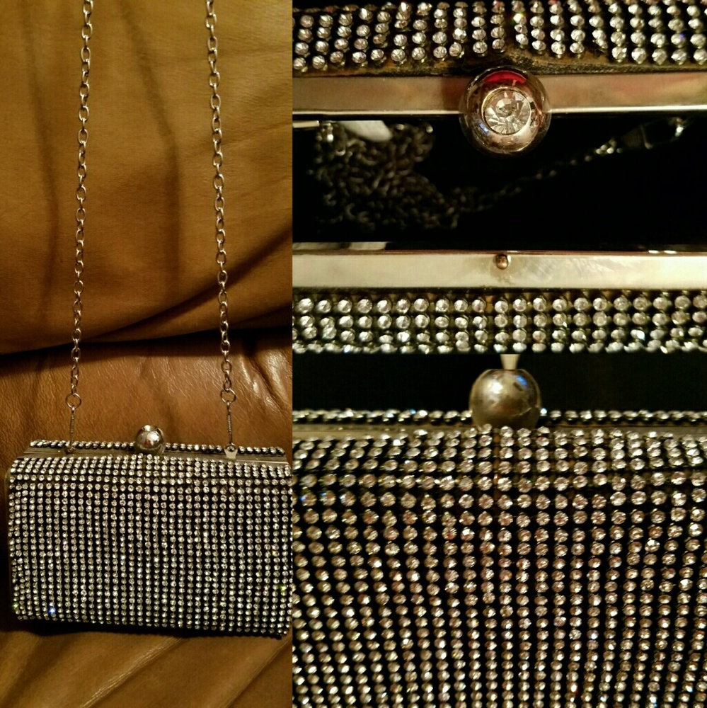 Embellished black clutch.
