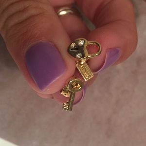 2 PAIRS COACH earrings