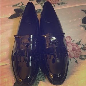 Black tassel and fringe platform shoes