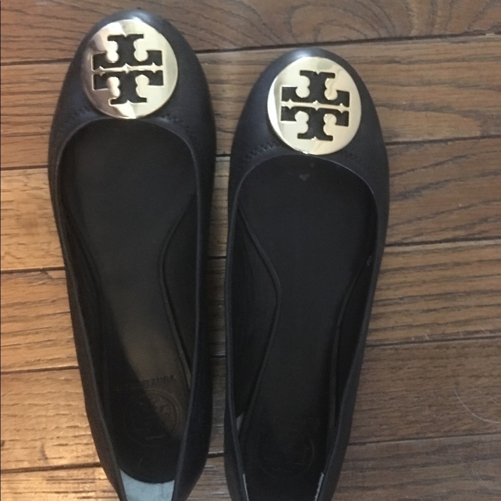 Tory Burch black flats with gold emblem