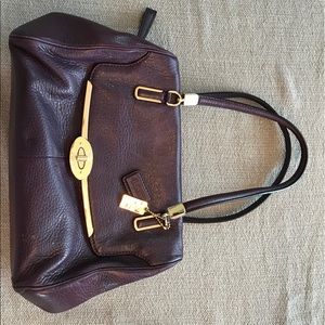 Plum colored leather Coach Purse