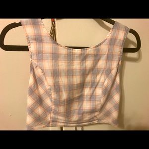 Plaid sleeveless crop top.