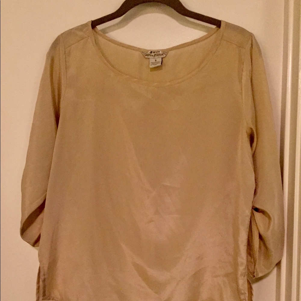 Flowing nude colored blouse