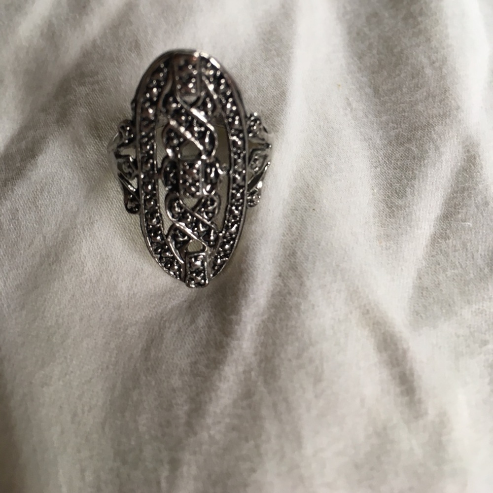 Silver colored ring