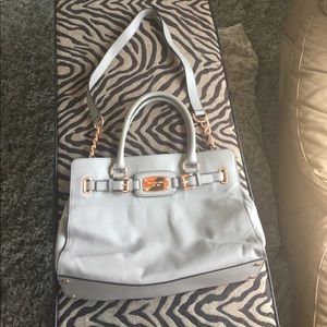 Grey Michael kors purse with rose gold