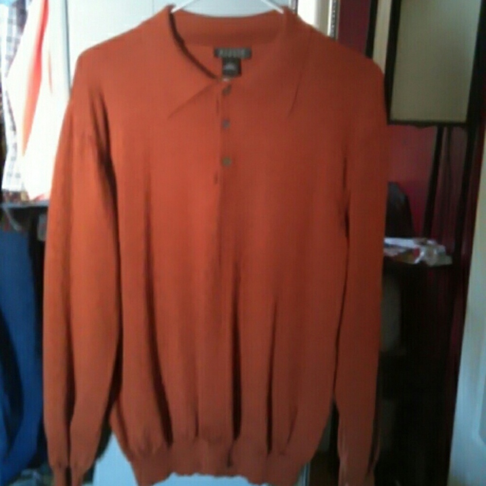 Harold Powell rust colored sweater