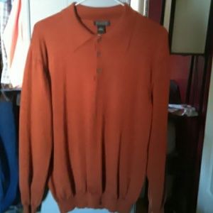 Harold Powell rust colored sweater