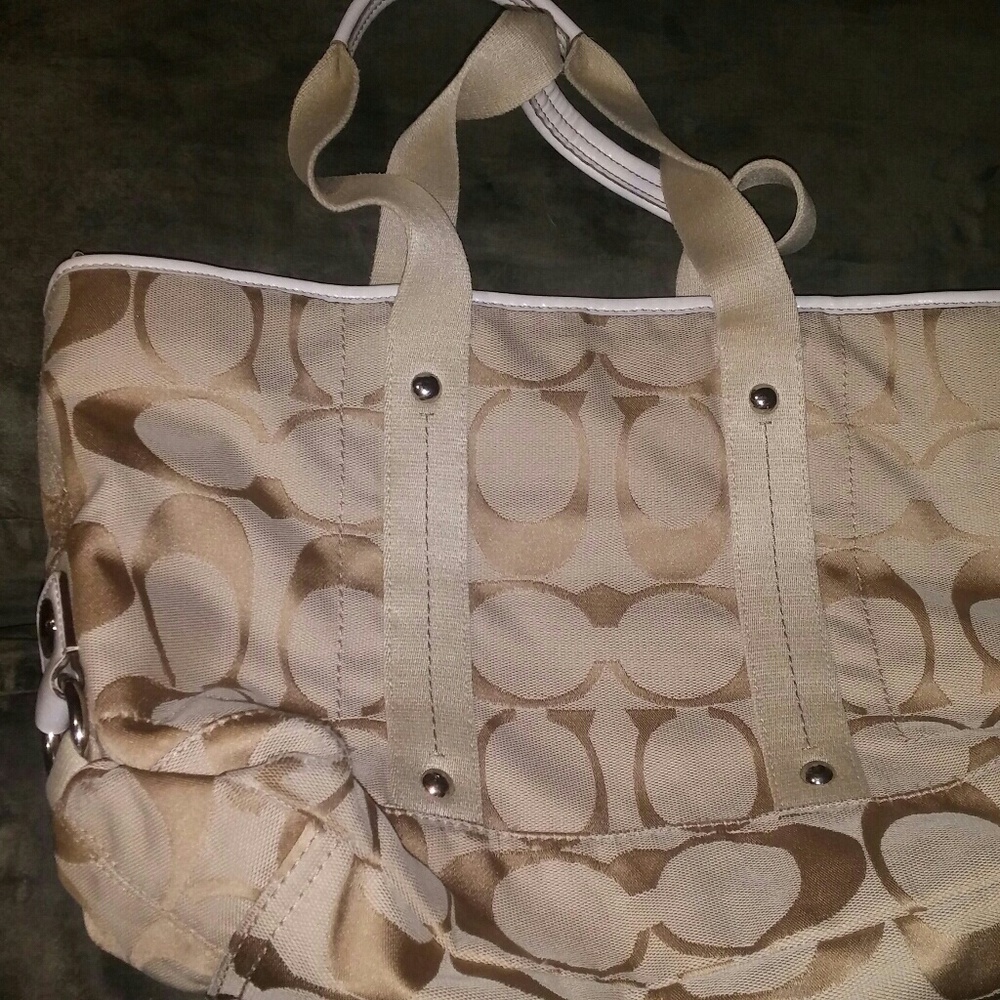 Beige and white Coach purse, clean inside and out,