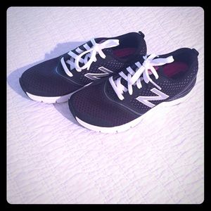 Never worn. New Balance 711 running shoes.