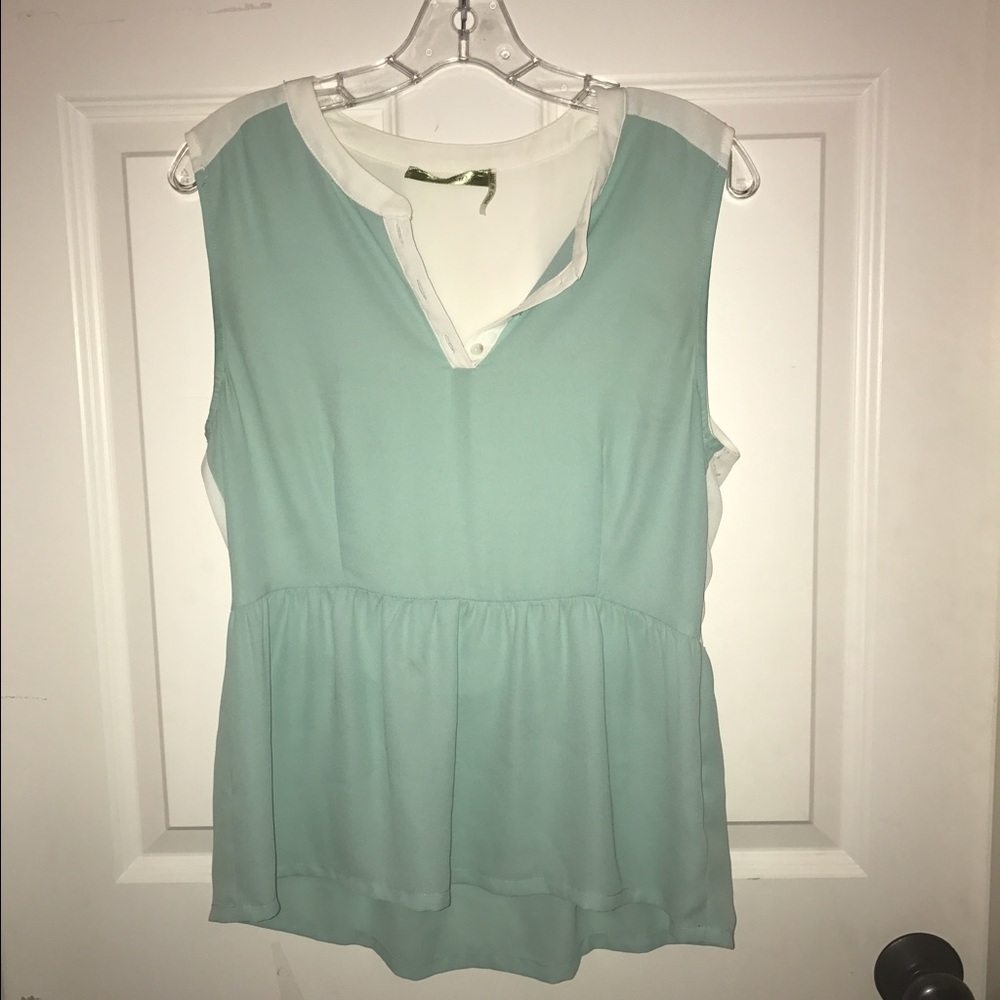 Turquoise and white blouse