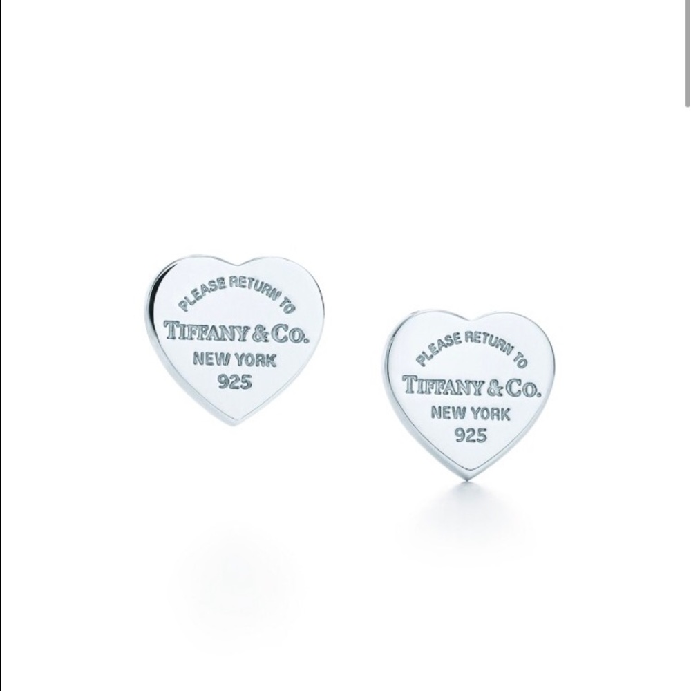 Tiffany heart earrings.  earring bag included
