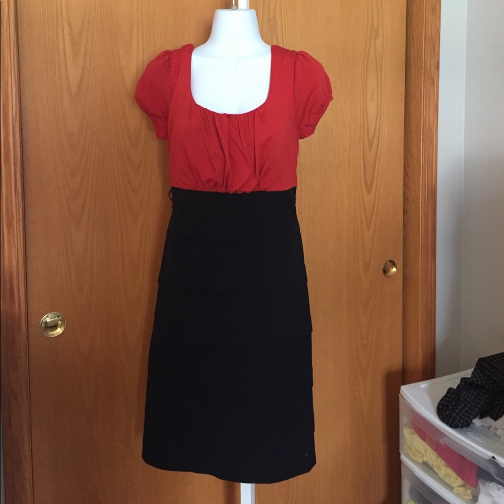 Cute and flattering orange and black Dress